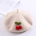 Béret en laine pour bébés avec motif cerises mignon